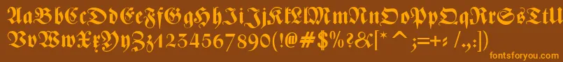 フォントZentenarFrakturOsfBold – オレンジ色の文字が茶色の背景にあります。