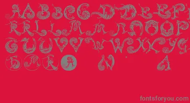 Schnoerkelcaps font – Gray Fonts On Red Background