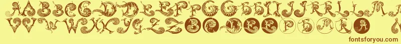Schnoerkelcaps-Schriftart – Braune Schriften auf gelbem Hintergrund