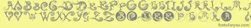Schnoerkelcaps Font – Gray Fonts on Yellow Background