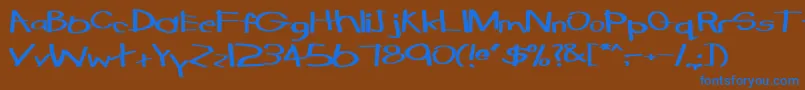 TabathaExBold-fontti – siniset fontit ruskealla taustalla