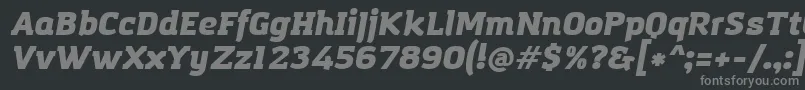 AmazingGroteskUltraItalic-fontti – harmaat kirjasimet mustalla taustalla