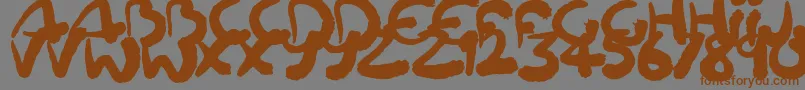 Шрифт Squiggler – коричневые шрифты на сером фоне