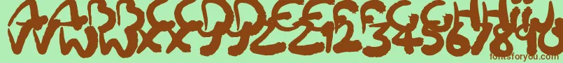 Squiggler-fontti – ruskeat fontit vihreällä taustalla