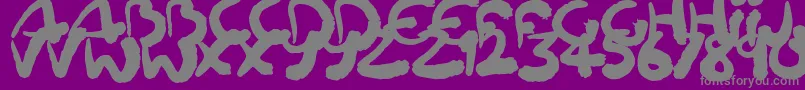 Squiggler-fontti – harmaat kirjasimet violetilla taustalla