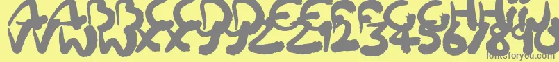 Squiggler-Schriftart – Graue Schriften auf gelbem Hintergrund