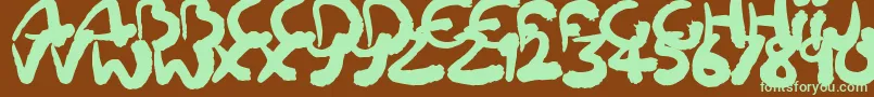 Squiggler-fontti – vihreät fontit ruskealla taustalla