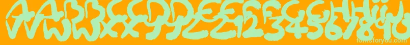 Squiggler Font – Green Fonts on Orange Background