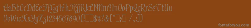 フォントHadfieldLetPlain.1.0 – 茶色の背景に灰色の文字