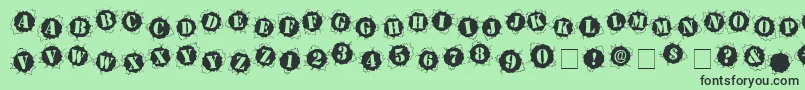 フォントBulletholz – 緑の背景に黒い文字