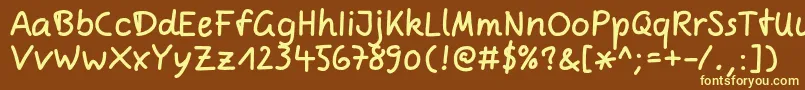 ComicjensRegular Font – Yellow Fonts on Brown Background