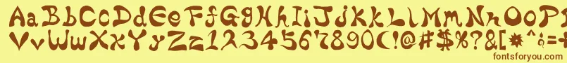 フォントBharaticFontV15 – 茶色の文字が黄色の背景にあります。