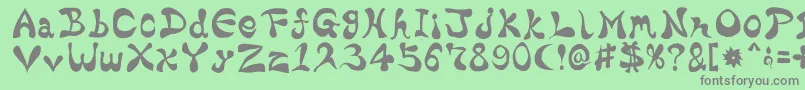 BharaticFontV15-fontti – harmaat kirjasimet vihreällä taustalla