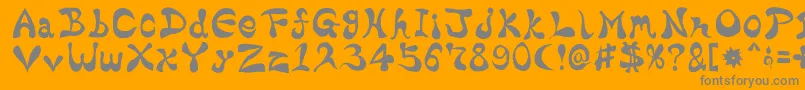 BharaticFontV15-fontti – harmaat kirjasimet oranssilla taustalla
