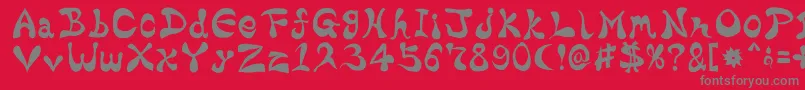 BharaticFontV15-fontti – harmaat kirjasimet punaisella taustalla