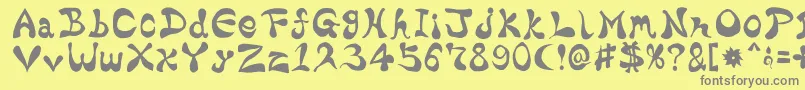 フォントBharaticFontV15 – 黄色の背景に灰色の文字