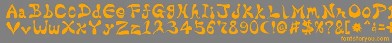 フォントBharaticFontV15 – オレンジの文字は灰色の背景にあります。