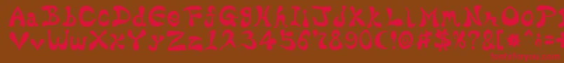 フォントBharaticFontV15 – 赤い文字が茶色の背景にあります。