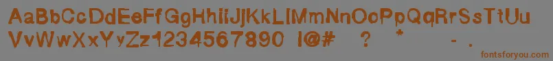 FluidMaska Font – Brown Fonts on Gray Background