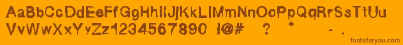 FluidMaska Font – Brown Fonts on Orange Background