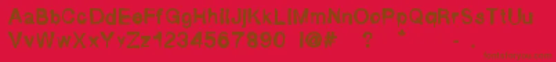 FluidMaska Font – Brown Fonts on Red Background