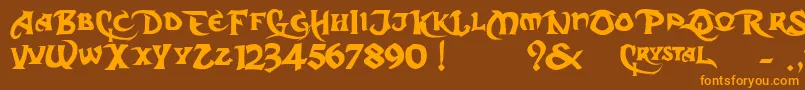 フォントDcS – オレンジ色の文字が茶色の背景にあります。