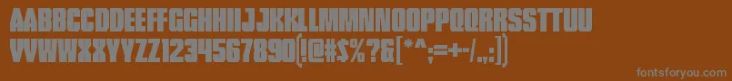 Fonte TankRegular – fontes cinzas em um fundo marrom