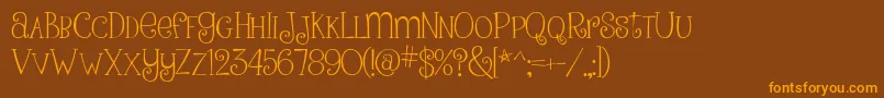 PinkLadiesAndPeanutbutterRegular-fontti – oranssit fontit ruskealla taustalla