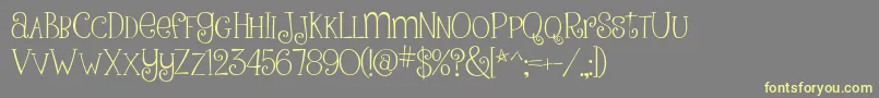 PinkLadiesAndPeanutbutterRegular Font – Yellow Fonts on Gray Background