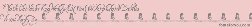 Więcej informacji o czcionce RagsToRiches Czcionka RagsToRiches – szare czcionki na różowym tle