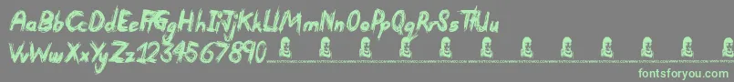 Devastated Font – Green Fonts on Gray Background