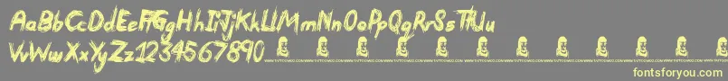 Devastated Font – Yellow Fonts on Gray Background