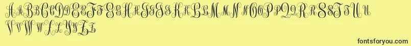 MonogramKkSc Font – Black Fonts on Yellow Background