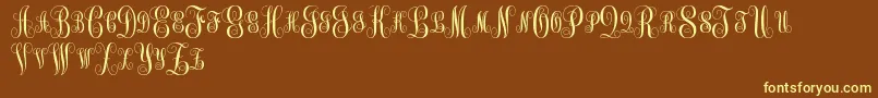 MonogramKkSc-Schriftart – Gelbe Schriften auf braunem Hintergrund