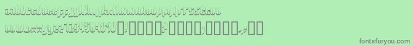 フォント44479 – 緑の背景に灰色の文字