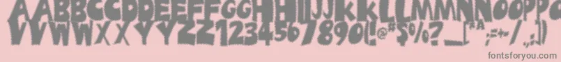 Ufrayd-fontti – harmaat kirjasimet vaaleanpunaisella taustalla