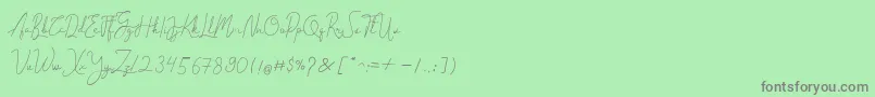 フォントCantilena – 緑の背景に灰色の文字