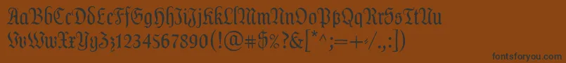 フォントDalaLtText – 黒い文字が茶色の背景にあります