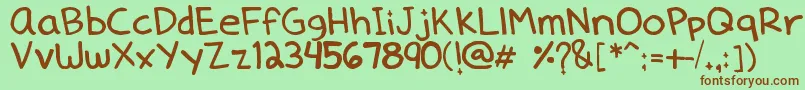 Dennedelica Font – Brown Fonts on Green Background