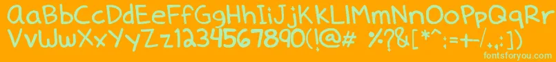 Dennedelica Font – Green Fonts on Orange Background