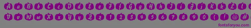 Czcionka Pumpkinese – fioletowe czcionki na szarym tle