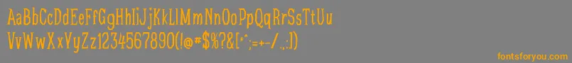 フォントChaosTheorie – オレンジの文字は灰色の背景にあります。