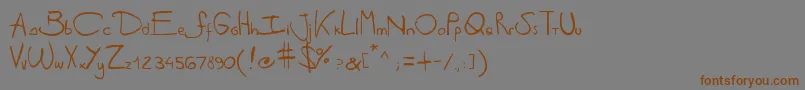 フォントAntipirinahandscript – 茶色の文字が灰色の背景にあります。