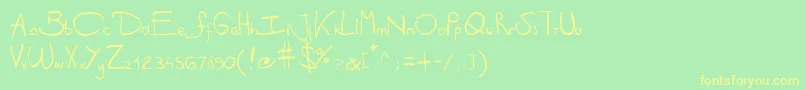 フォントAntipirinahandscript – 黄色の文字が緑の背景にあります
