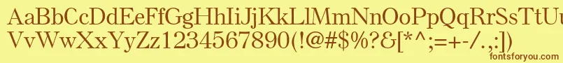 Шрифт ElsenplstdMedium – коричневые шрифты на жёлтом фоне