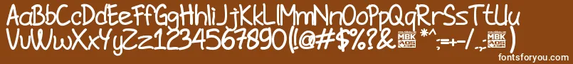 JombloNgenesBold-fontti – valkoiset fontit ruskealla taustalla