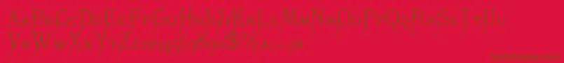 K22Monastic Font – Brown Fonts on Red Background