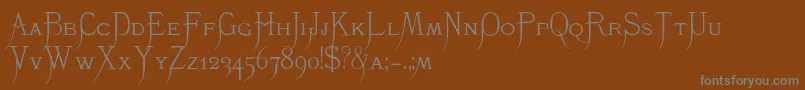 Weitere Informationen zur K22Monastic-Schriftart K22Monastic-Schriftart – Graue Schriften auf braunem Hintergrund