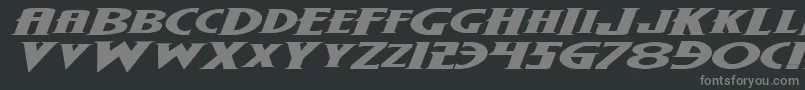 WolfsBaneExpandedItalic-fontti – harmaat kirjasimet mustalla taustalla