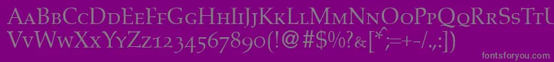 AldonecapsdbNormal-fontti – harmaat kirjasimet violetilla taustalla